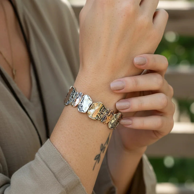 Bohemian multi-tone textured bracelet with gold and silver geometric designs