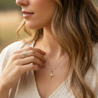 Gold dipped hummingbird necklace with a delicate chain and small pendant for elegant style