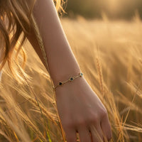 Gold dipped dainty clover bracelet with black stones for women’s boho chic