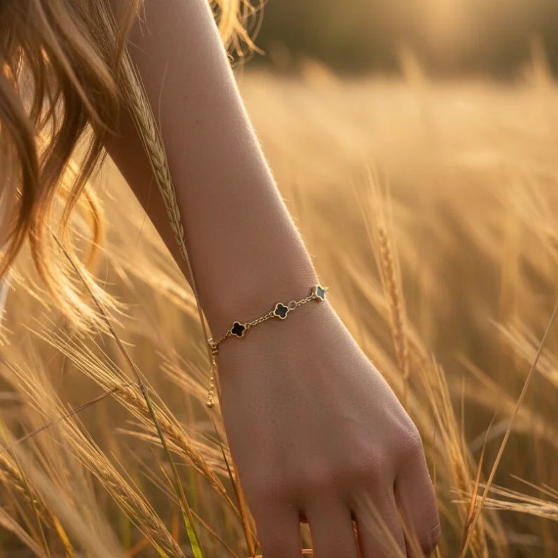 Gold dipped dainty clover bracelet with black stones for women’s boho chic