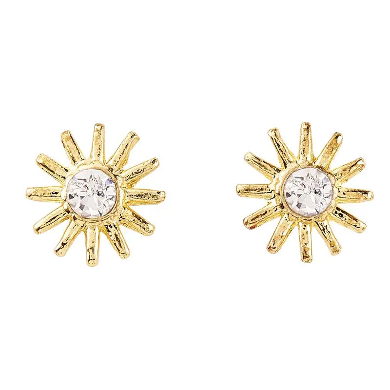 Gold sun-shaped stud earrings with clear gemstones from the Treasure Box collection