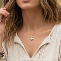 Brilliant gold dipped teddy bear necklace with diamond accents from BRILLIANT GOLD DIPPED TEDDY NECKLACE