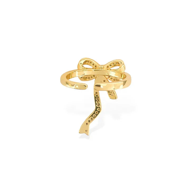 Gold-tone tied bow ribbon gold ring with pavé-set gemstones for elegant jewelry style