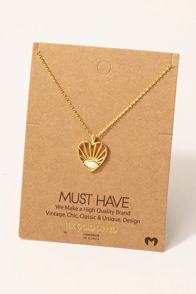 Gold-toned oval stud heart pendant necklace with intricate shell design detail