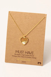 Gold-toned oval stud heart pendant necklace with intricate shell design detail