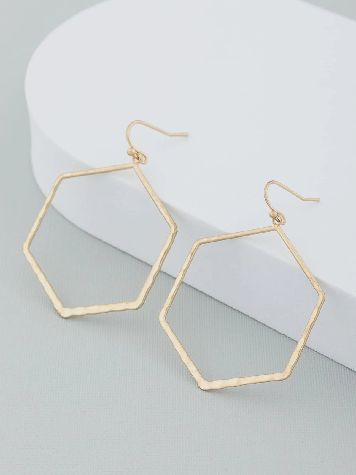 Gold-toned geometric shaped cut out slant earrings alloy with fishhook closures