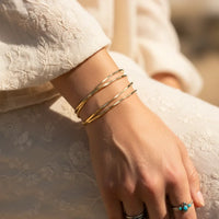 Twisted hammered cuff gold bracelet with turquoise stone ring