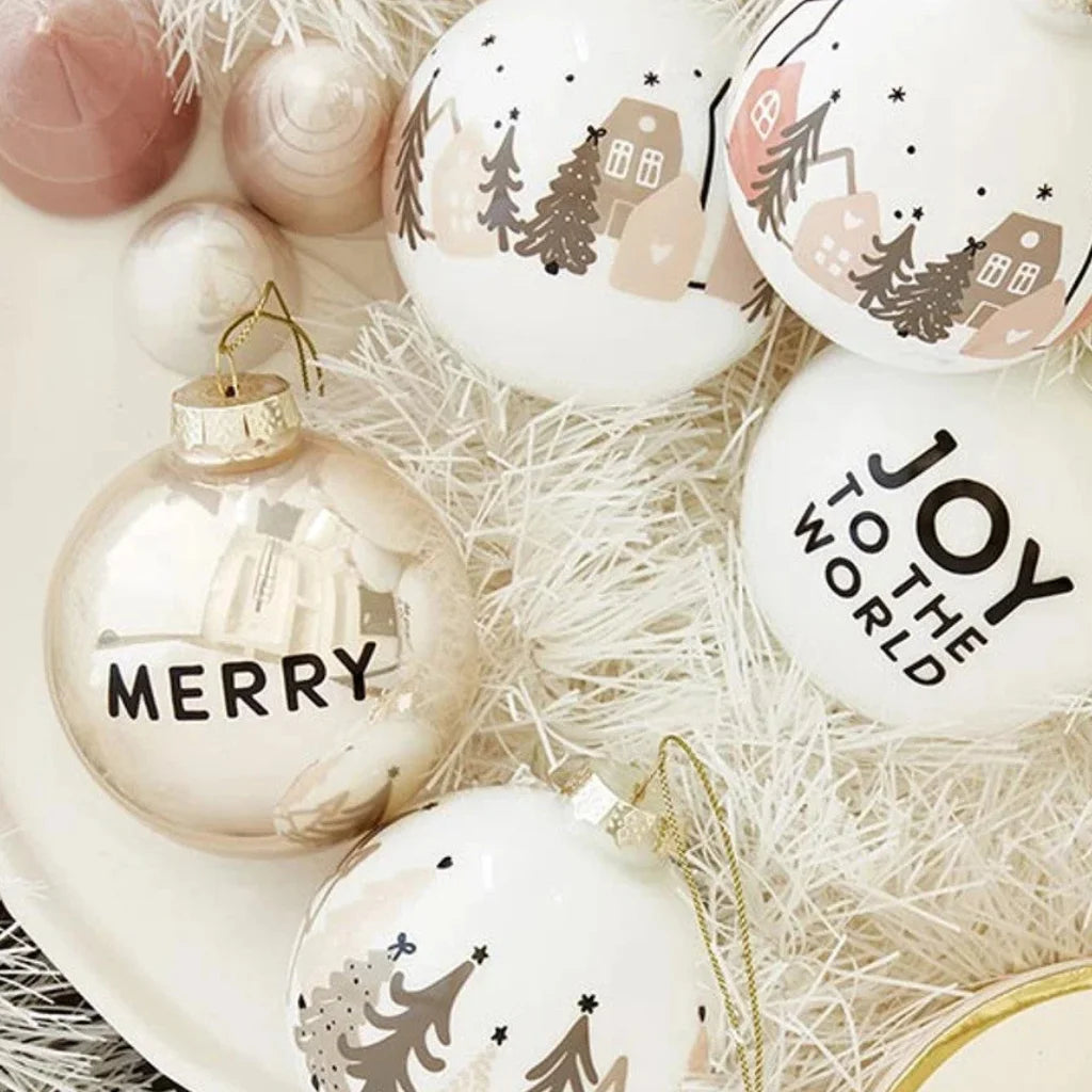 Elegant gold and white glass Christmas ornaments set with Merry text