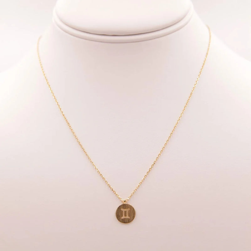 Gold Gemini Zodiac Sign Necklace elegantly displayed, perfect for celebrating the Gemini zodiac