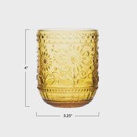 Golden glass candle holder with measurements for the embossed drinking glass product