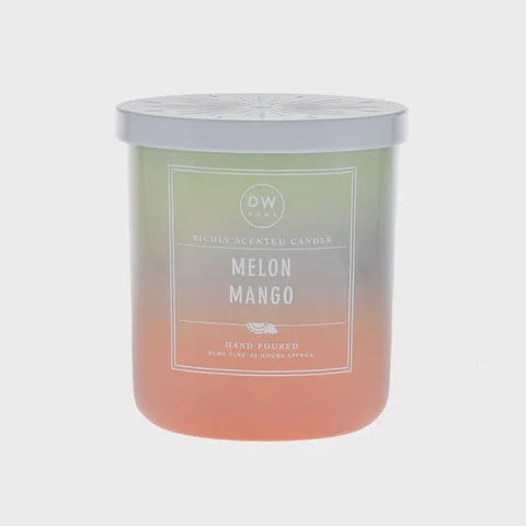 Gradient-colored Melon Mango Candle in glass, perfect for women’s boho chic clothing styles