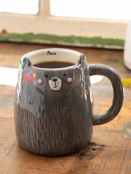 Gray ceramic bear-shaped coffee mug with floral details from Mama Bear Folk Art