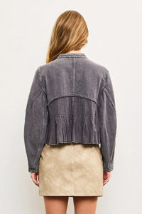 Gray denim jacket with pleated peplum from Shop Daisy, ideal for women’s boho chic clothing