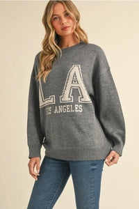 Gray Los Angeles lettering sweater with white text and ribbed trim