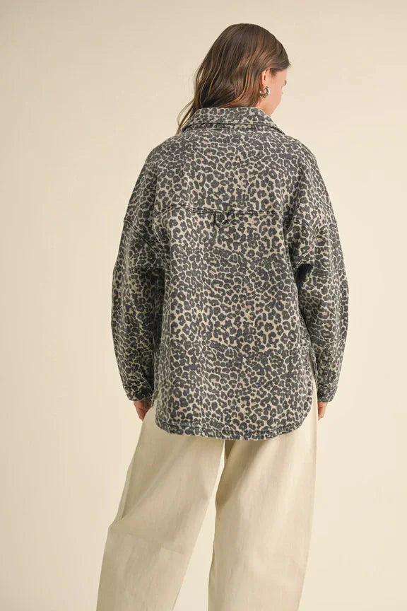 Gray leopard print fleece pullover jacket, perfect for women’s boho chic clothing at Shop Daisy