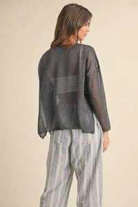 Gray oversized sweater with relaxed fit, ideal for women’s boho chic clothing at Shop Daisy