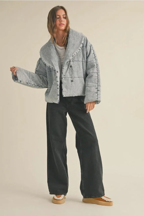 Gray quilted tie close denim jacket with black stitching and wide-leg pants