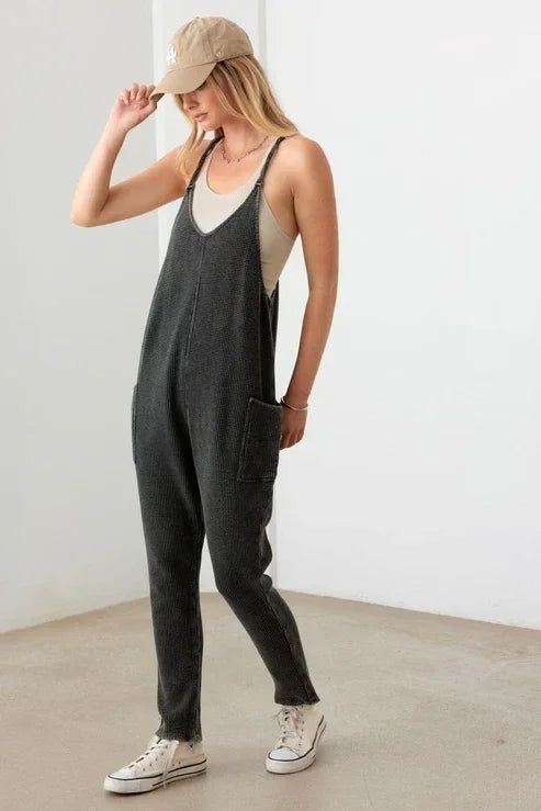 Gray sleeveless jumpsuit with V-neck, tapered legs, perfect for a boho free spirit