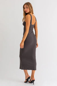 Form-fitting gray sleeveless midi dress featuring a laser cut sleeve ribbed design