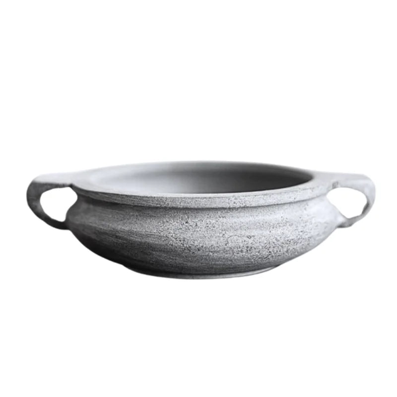 Gray and white speckled soapstone bowl in gray blue slate stone with handles