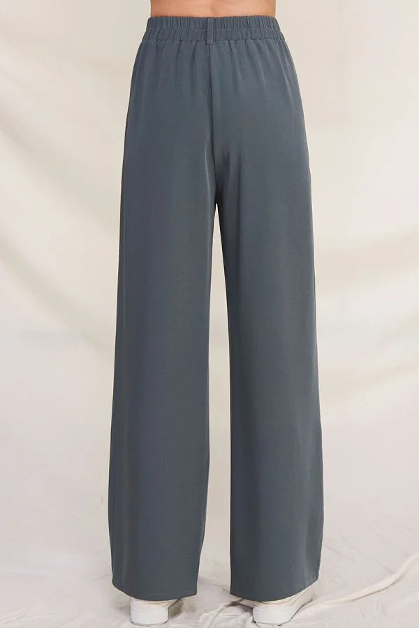 Gray twill girdle pocket wide pants with elastic waistband for comfort and style