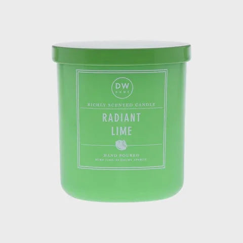 Green cylindrical candle container labeled Radiant Lime from DW Home, perfect for a boho vibe