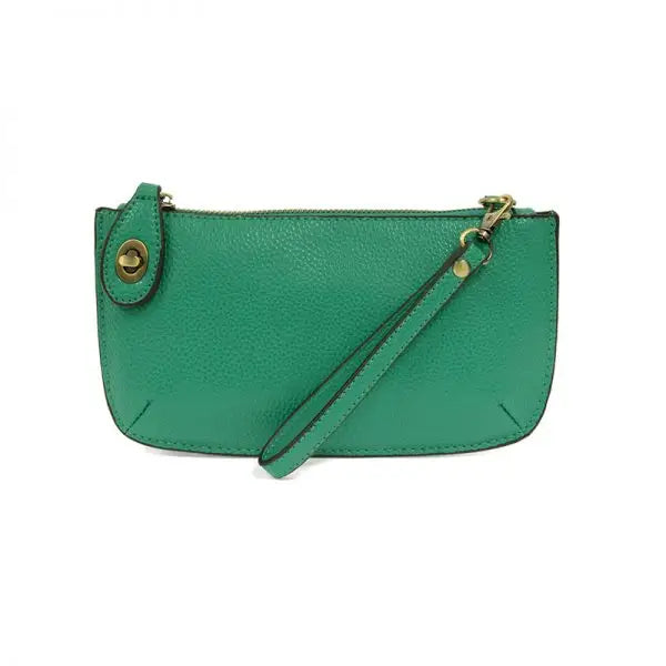 Green faux leather wristlet with card slots from the MINI CROSSBODY WRISTLET CLUTCH