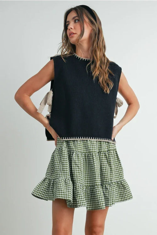Green gingham ruffled mini skirt with mock neck sleeveless sweater