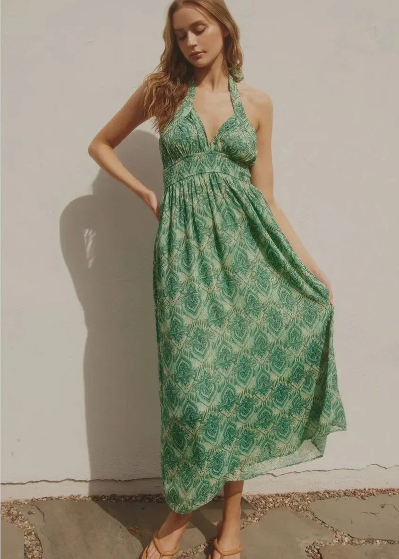 Green Jade Keyhole Halter Maxi Dress featuring a floral pattern and elegant design