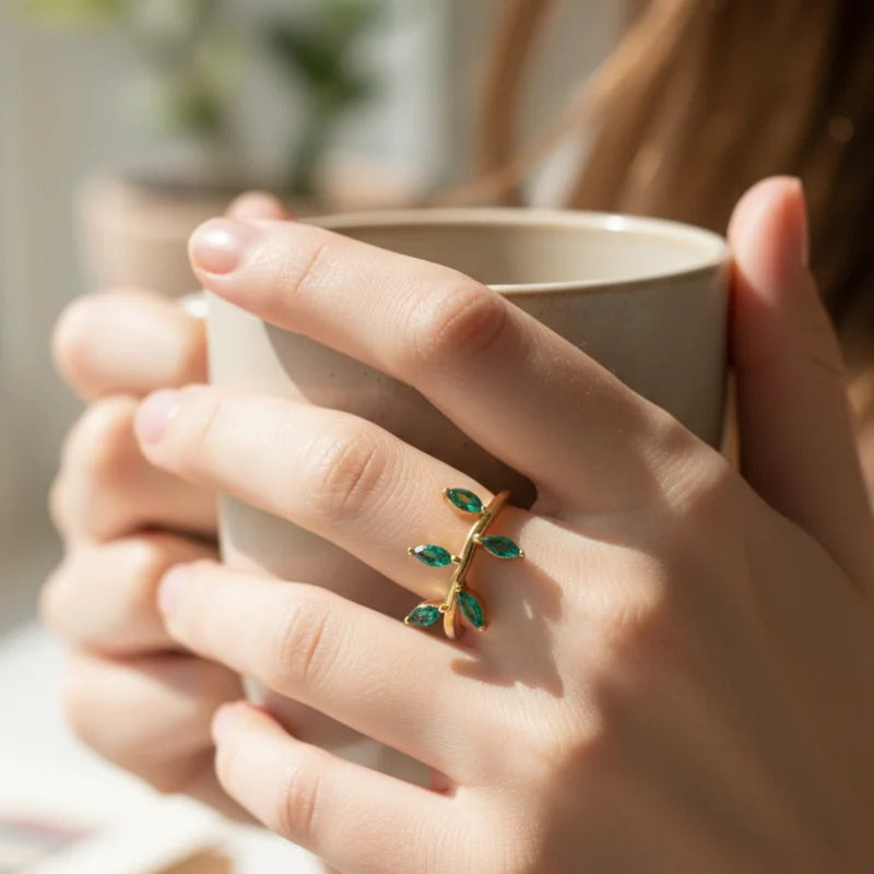 Gold Emerald Leaf Vine Ring with Delicate Green Branch Design