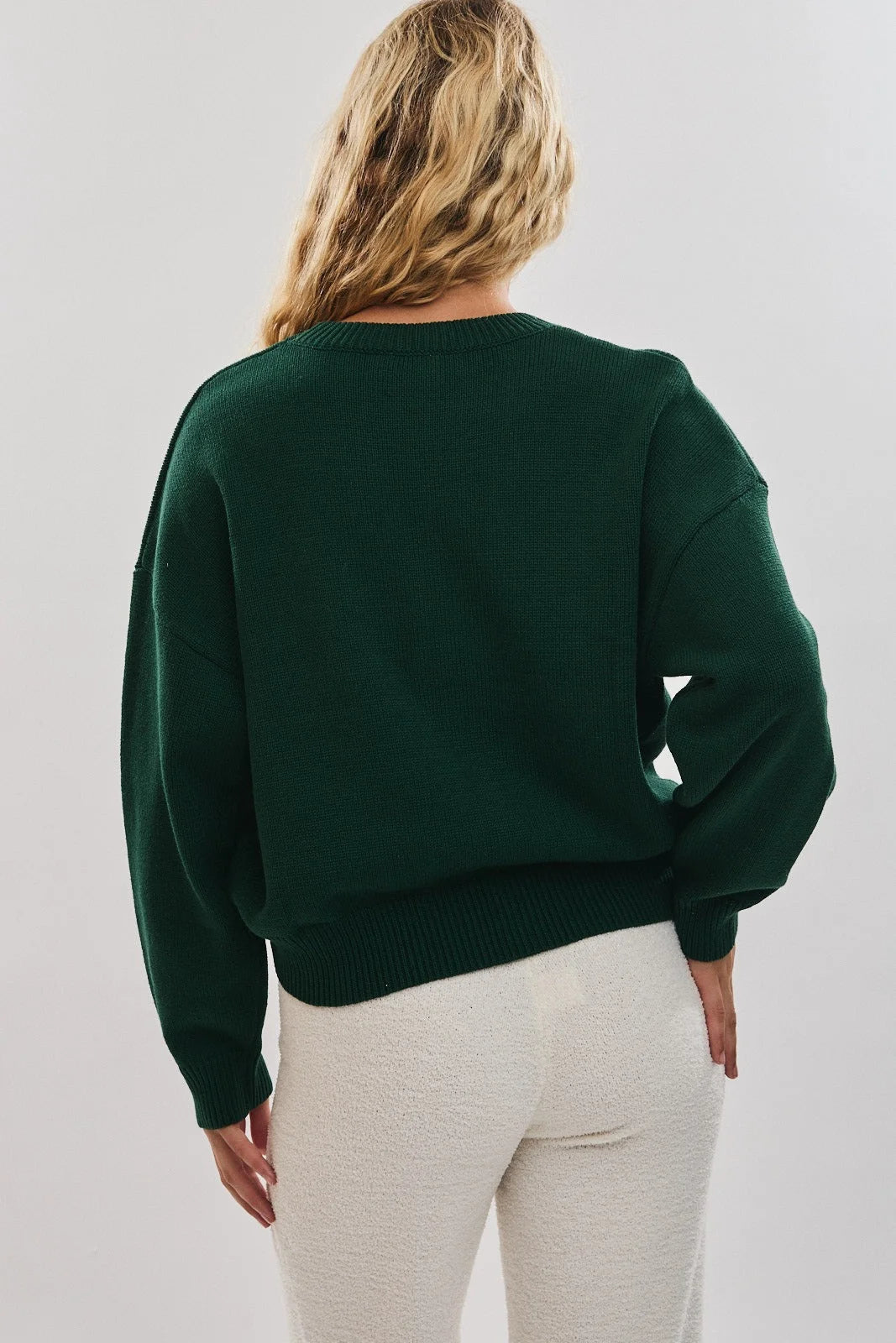 Green Gingerbread Graphic Sweater with oversized fit and ribbed cuffs