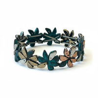 Bohemian Verdigris Bloom Bracelet with green silver floral stretch and metallic leaves