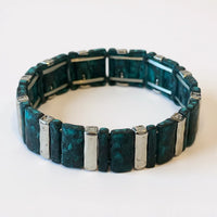 Artisan teal silver stretch bracelet with green textured rectangular beads