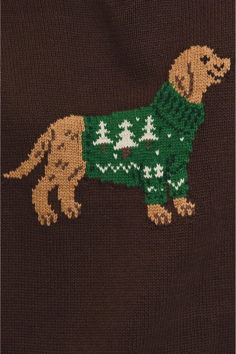 Crew neck Christmas dog sweater with green base, white trees, and brown dog pattern on dark background