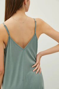 Green V-neck slip dress with adjustable straps, part of the adjustable strap maxi dress collection