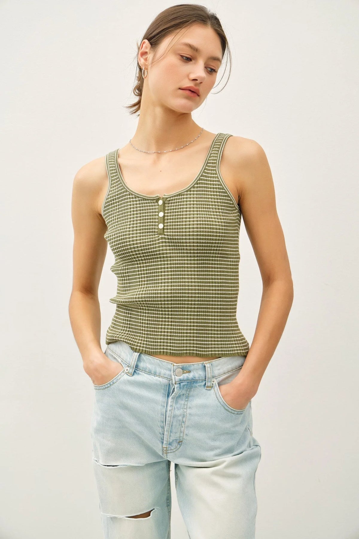 Green and white striped knit button-up Henley tank top with ribbed texture