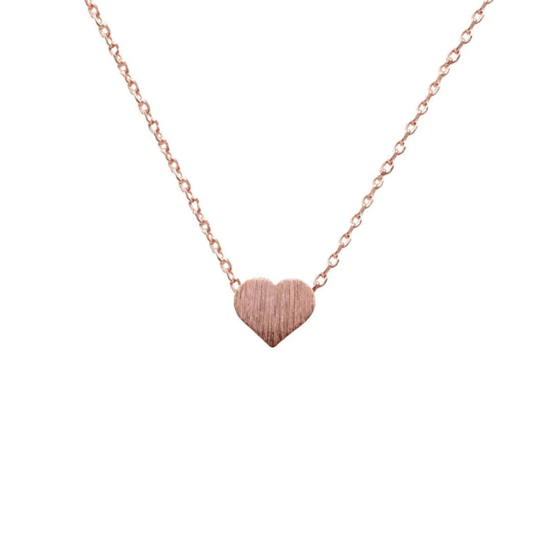 Rose gold Dainty Heart Necklace displayed elegantly, highlighting its delicate design