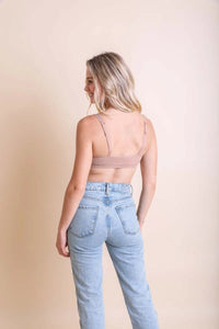 High waist crop jeans in light blue paired with a Padded Ribbed Keyhole Front Bralette