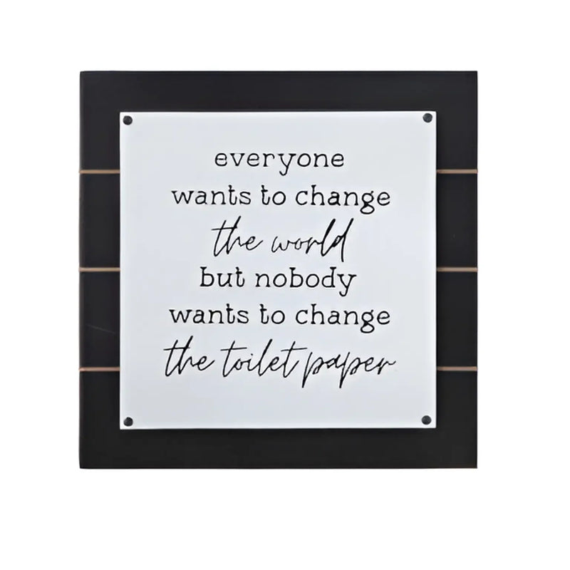 Humorous bathroom wall decor featuring the Everyone Wants to Change the World Sign with a women’s boho chic clothing theme for Shop Daisy
