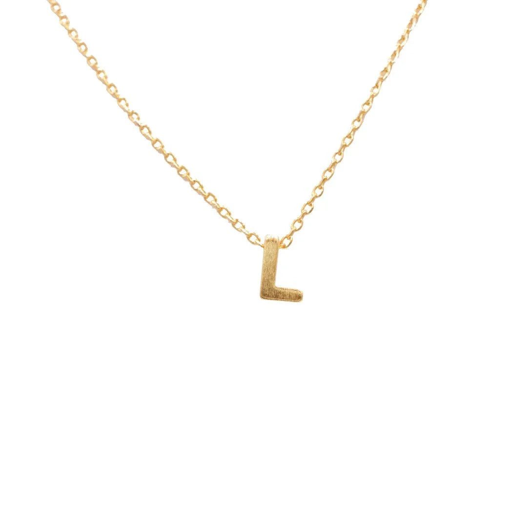 Dainty Initial L Gold Necklace from Daisy Lane showcased elegantly on display