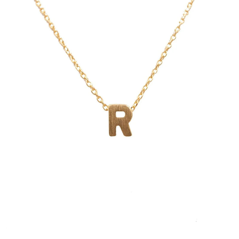 Dainty Initial R Gold Necklace displayed elegantly at Daisy Lane for a stylish accessory