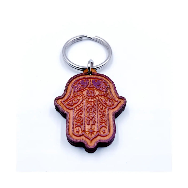 Hamsa Hand Wooden Key Chain featuring a unique and artistic design