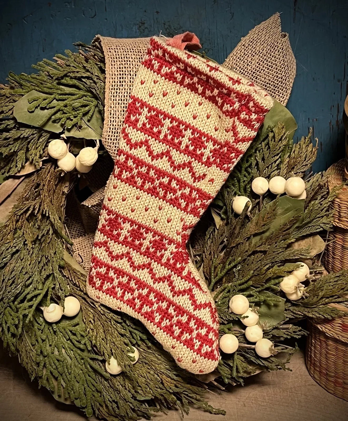 Knitted red mini Christmas stocking with white Nordic pattern for Christmas stockings holder