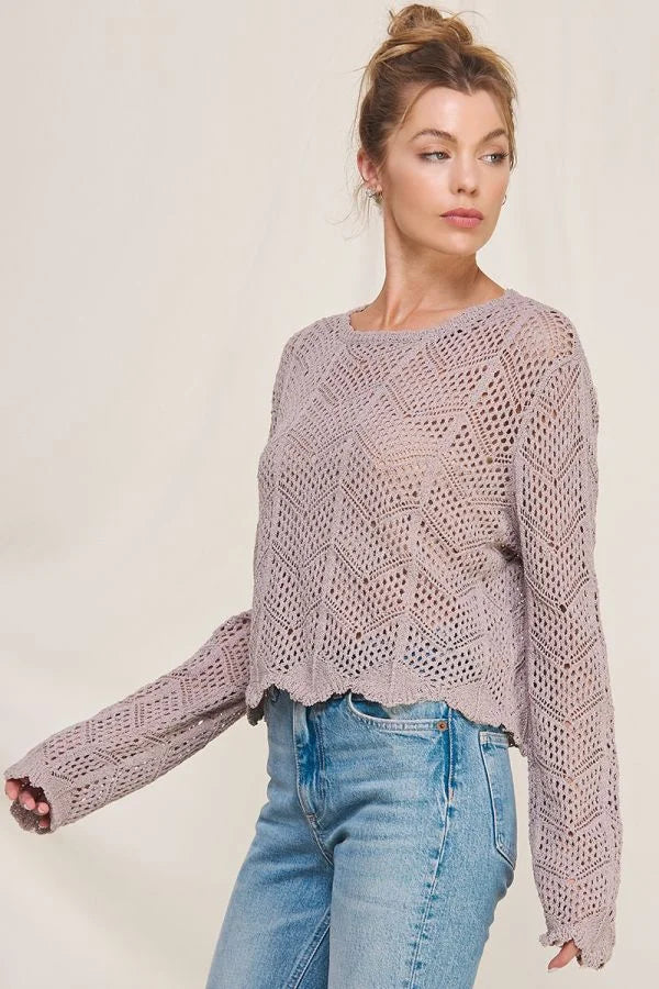 Knitted lavender long sleeve chevron pointelle sweater with open weave and scalloped hem