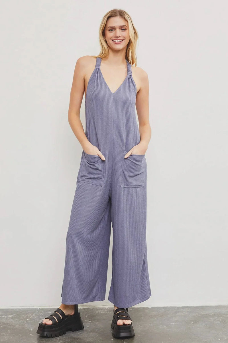 Lavender sleeveless jumpsuit with wide legs and front pockets from Shop Daisy, women’s boho chic clothing