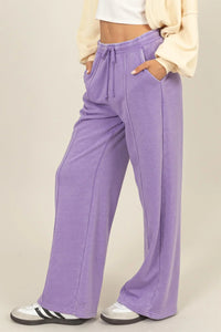 Lavender wide-leg sweatpants with drawstring waist, perfect for women’s boho chic clothing