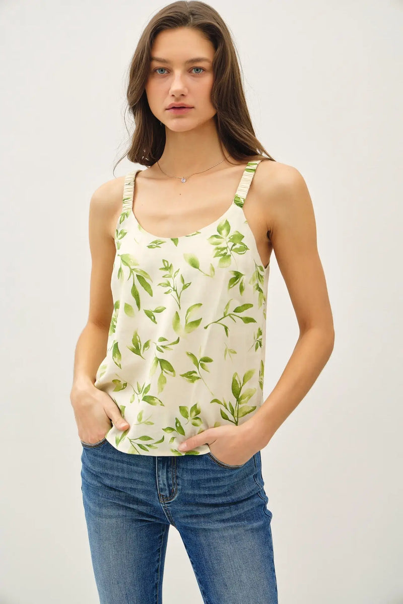 Leaf-patterned tank top showcasing breezy floral print and elastic straps for a stylish look