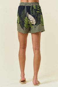 Leaf-patterned women’s shorts with border palm tree design and elastic waist for comfort