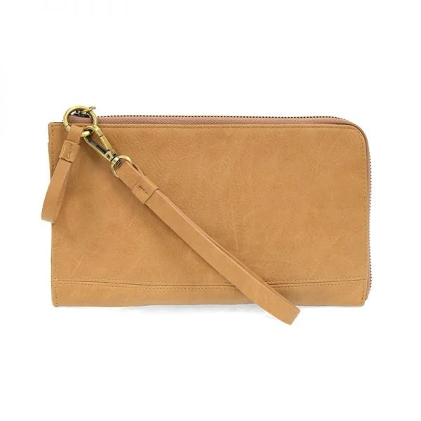 Tan leather wallet featuring credit card slots in the Karina Convertible Wristlet