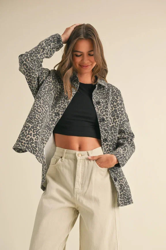 Leopard print stretch shacket over black crop top and cream pants from Shop Daisy